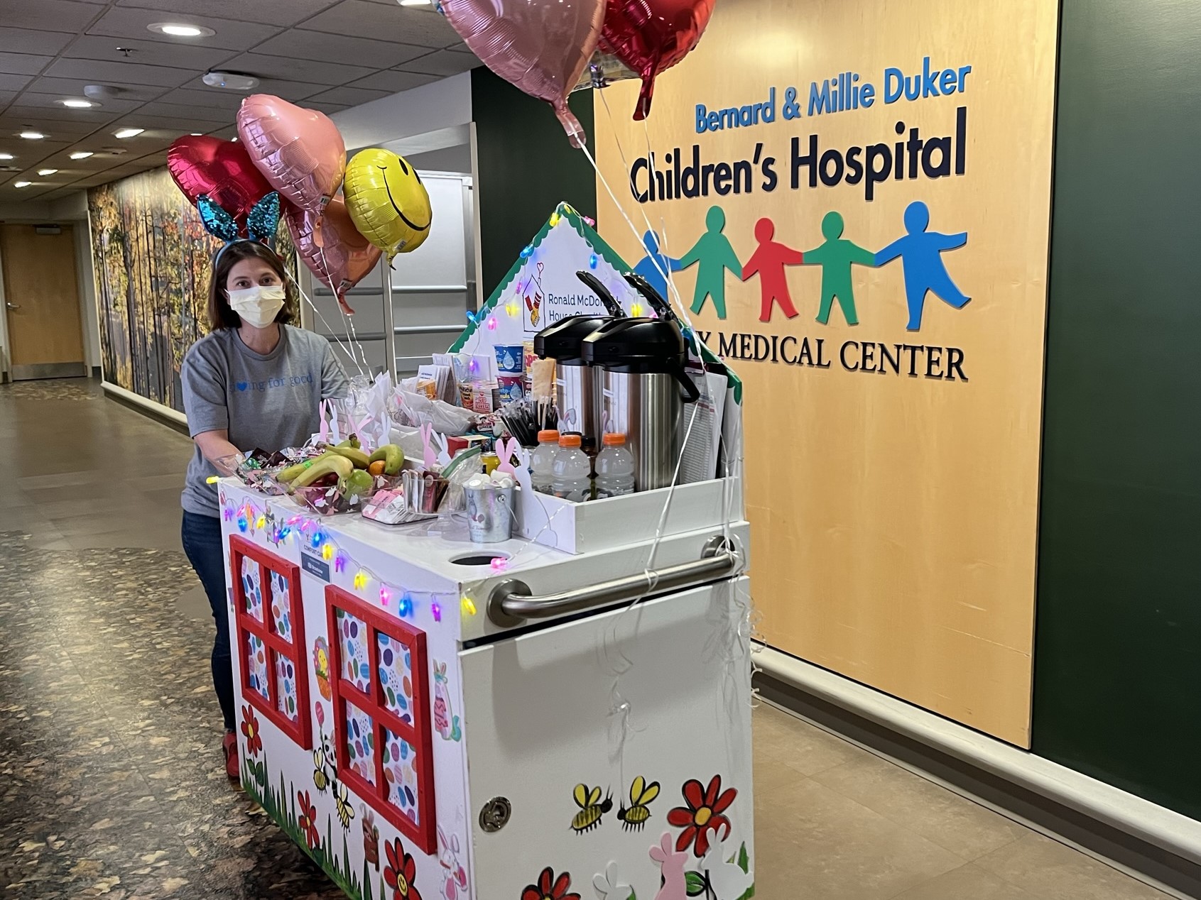 Broadview's Community Impact Director, Katie Farrow, maneuvers the Comfort Cart through the halls of the Bernard & Millie Duker Children's Hospital at Albany Med.