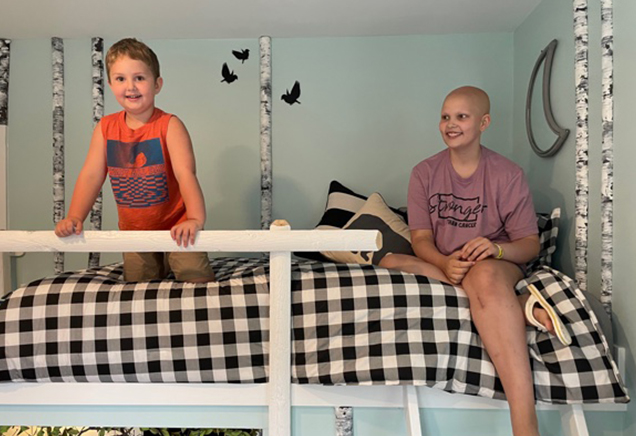 Carter and Anna LaBella checking out a bedroom at the Ronald McDonald Family Retreat at Krantz Cottage