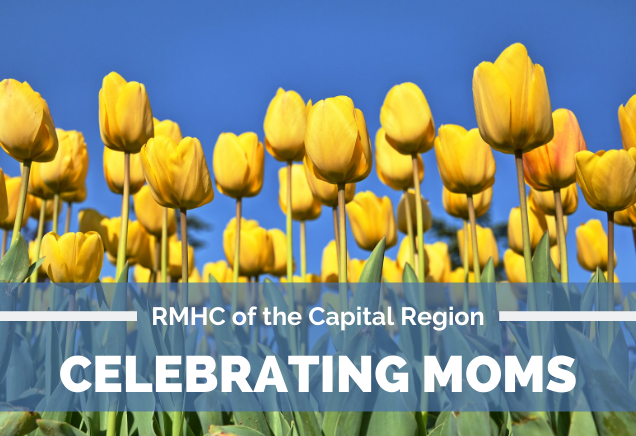 Yellow tulips against a blue background with Celebrating Moms headline